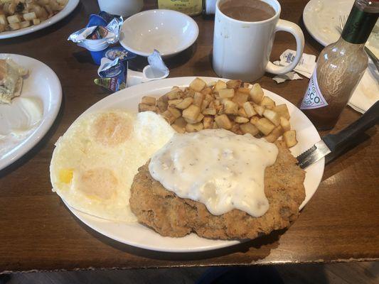 Country fried steak and eggs