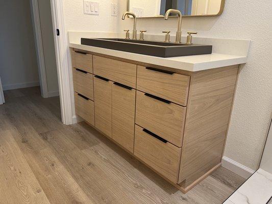 Quartz countertop with oversize sink.