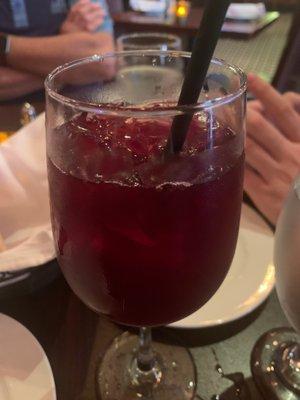 Delicious red sangria!   Love that they use a paper straw!