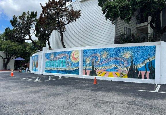 Artist Chacasso working on the new mural at the complex Wed. 6/26/24