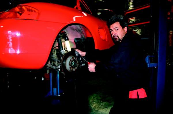 Owner David performing a complete brake inspection.