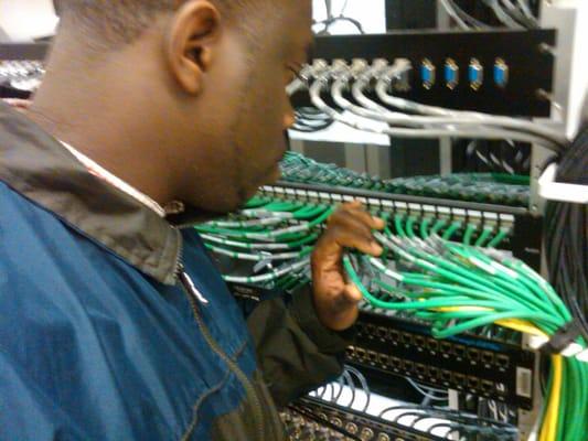 Installation of network switch equipment. Verifying cable numbers.