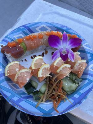 Rainbow Roll and a yummy salmon situation with lemon and California roll base!