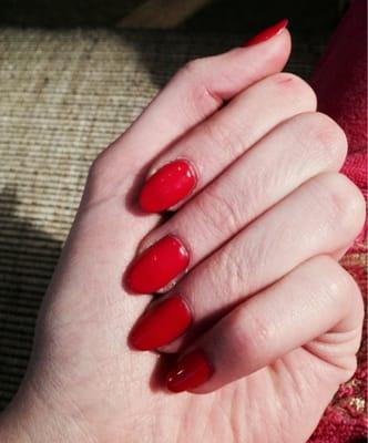 Absolutely gorgeous red gel mani and nice pedi . Good and polite