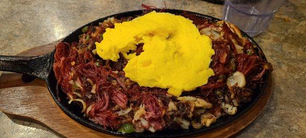 Corn beef hash with scrambled eggs