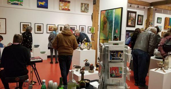 A few photos in the Attic Gallery. Open late every First Friday of the month from 5pm-8pm with live music, wine, refreshments and artists!!!