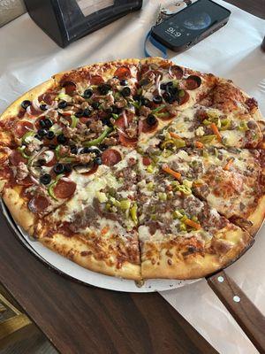 16" half warrior (supreme) and half monthly special (Italian beef with spicy Giardiniera)!  Regular crust is excellent.