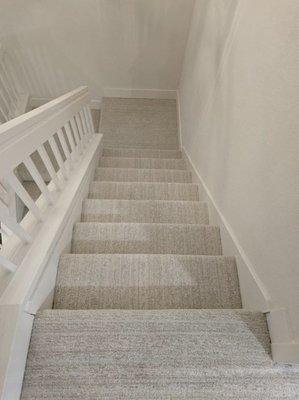 We installed new DreamWeaver carpet all throughout the bedrooms, stairs and landing of this home.