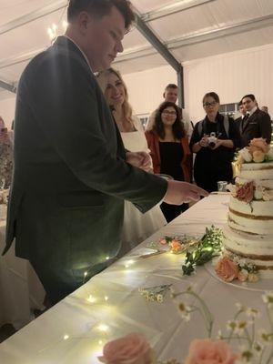 Cutting the cake . Maria in the background:)