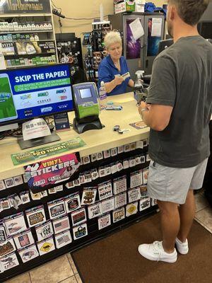 The cashier telling us about her dark past.