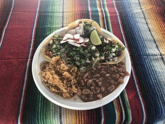 * 4 Tacos beef with rice and beans.  * 4 Tacos de asada con arroz y frijoles.