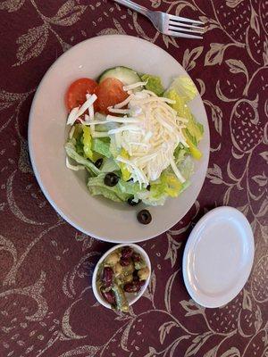 Salad with bleu cheese dressing and the little dish of three bean salad.