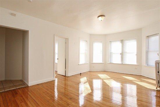 Living room with a lot of windows & natural sunlight