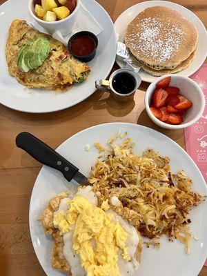 Omlet and biscuit with fried chicken