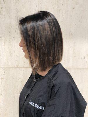 Dimensional highlights with tape in extensions to add thickness and color.