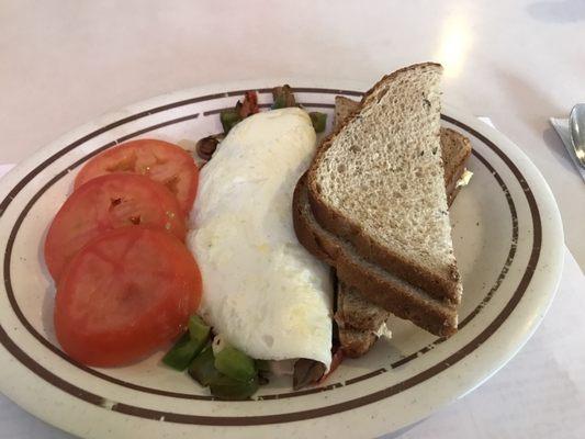 Egg white omelette with tomato slices and Rye toast