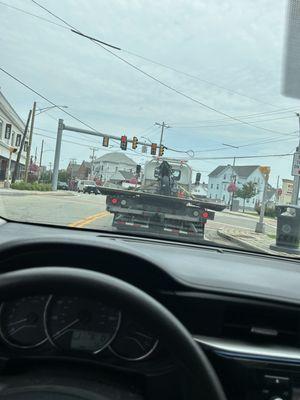 Tow truck towing my bike to Adrenaline Rush