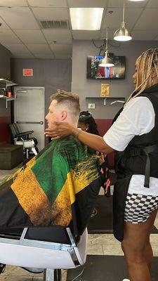 Barber Nakia working her magic