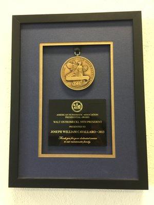 American Numismatic Association Presidential Award (awarded to Joe Cavallaro, who regularly helps at the coin store).