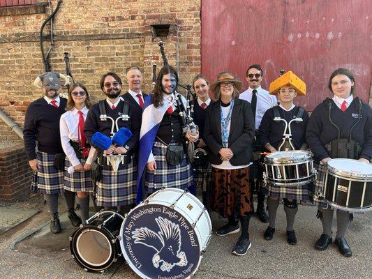 The Umw Eagle band leading the Fred Parent Halloween Costume Stroll