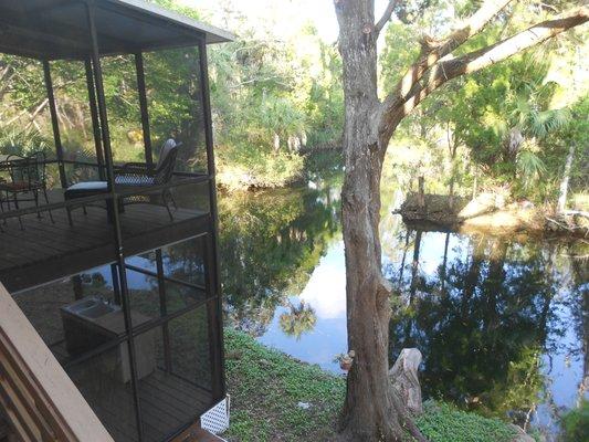 Screened porch in Crystal River overlooking a local Spring