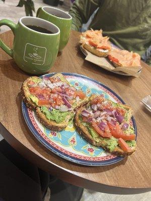 Avocado toast and smoked salmon bagel with 2 small black coffees