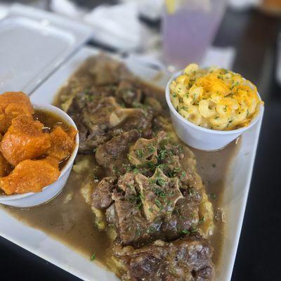 Oxtails Over Mashed Potatoes / Yams / Mac n Cheese