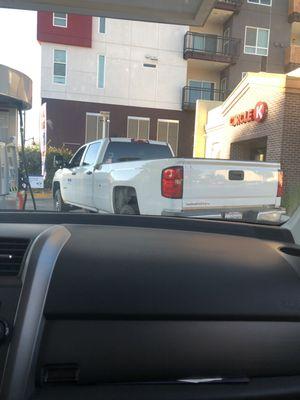 DMS truck not even getting gas. He was inside buying food. This jerk parked in a way where cars couldn't even drive by to exit.