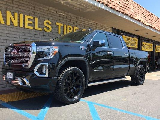 We installed new tires and wheels on this GMC Denali pick up.