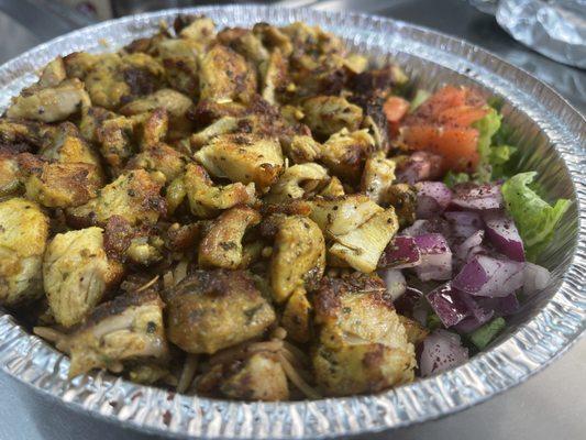 Roooster Bowl: Signature Chicken Served Over Afghan Rice 
Red Onions, Lettuce, and Tomatoes are Served on the Side