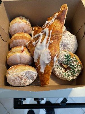 Traditional Polish prune and berry jam-filled donuts and apple turnovers.  Yum!