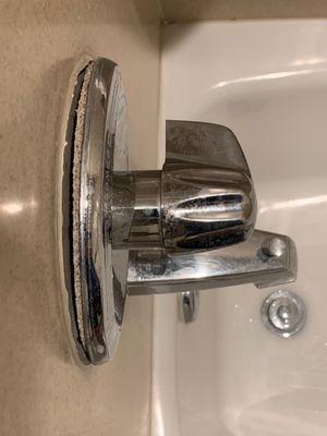 water faucet flange pulled away from wall