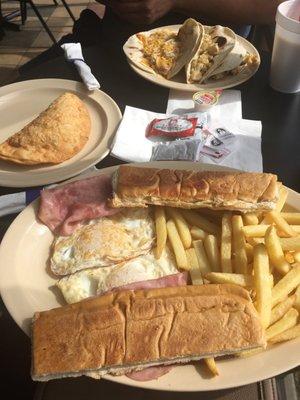 Cuban breakfast plate, empanada, breakfast tacos