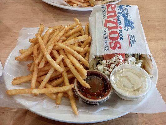 Traditional gyro with tzatziki and spicy bbq on the side. Absolutely amazing