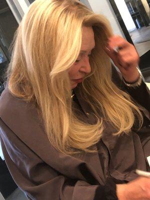 client gets blonde highlights and root touch up.