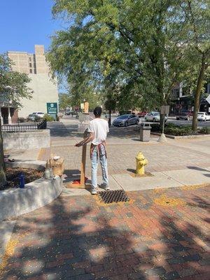 Guy painting Building