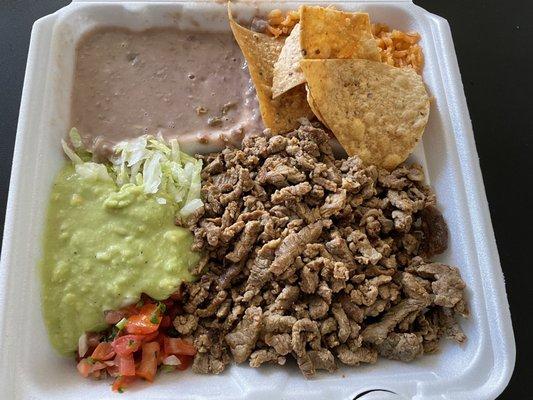 Carne asada plate with soupy beans, dry rice and flavorless carne asada