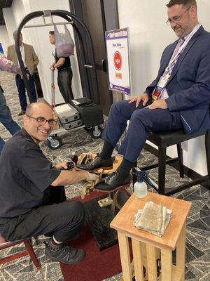 Shoe shining at J.W. Marriott during a convention.