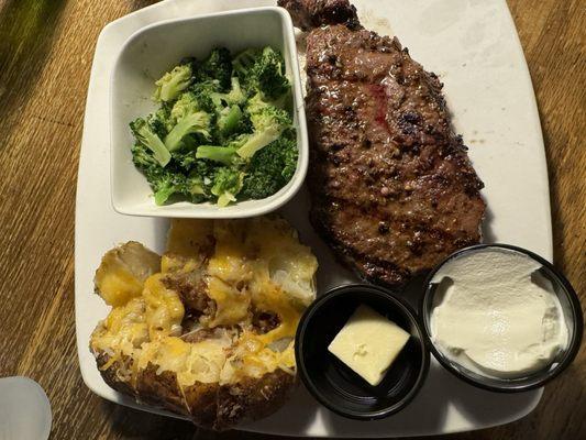 Steak, broccoli, baked potato