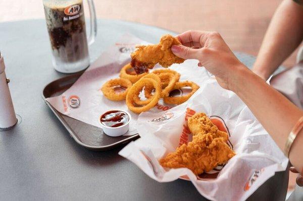 Chicken Tenders and Onion rings make for a great lunch.  Our tenders are hand breaded in our kitchen right before cooking!