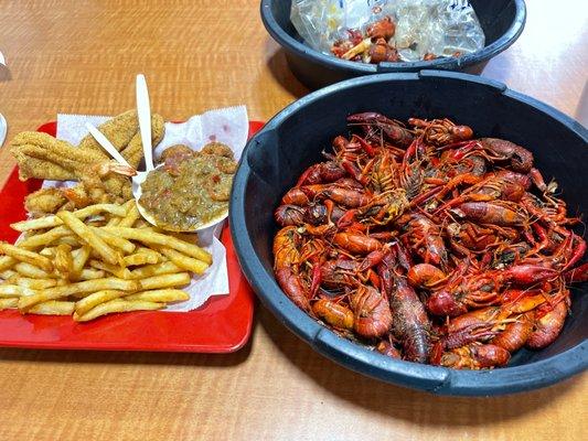 Seafood platter, catfish, shrimp, fries, hush puppies and crawfish étouffée.  Three pounds of crawfish.