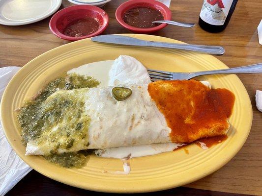 Burrito Bandera~ Steak, Shrimp and chicken, with rice, beans and sour cream. Amazing