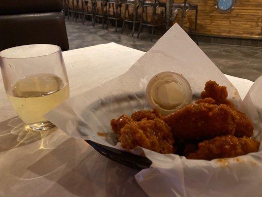 Wings appetizer +$3 wine (Thu)