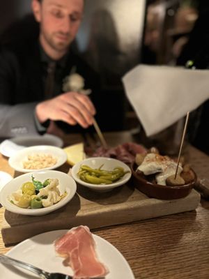 Charcuterie and potatoes bravas