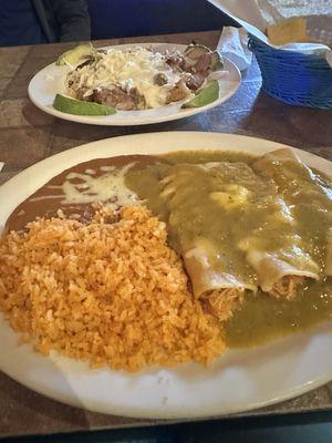 Chicken enchiladas verdes with rice and beans