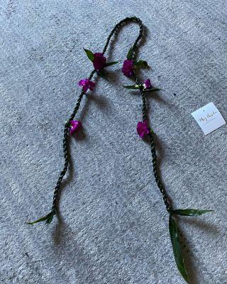 Ti leaf with carnation lei