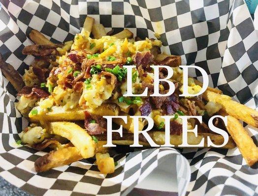 Out loaded fries topped with Dilly sauce, bacon, and spiny lobster!