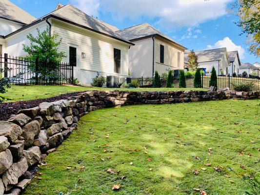 Boulder Wall, Zoysia Sod, Stone Step Treads