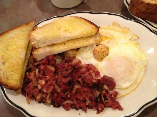 Snap's homemade corned beef hash with eggs, home fries & toast