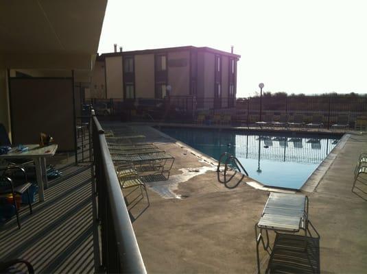 Pool side at sunrise. Just steps away from the beach